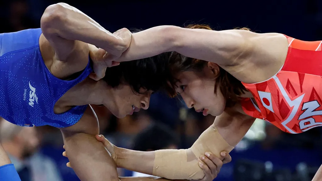 vinesh Phogat's (left) win against reigning world champion Yui Susaki stunned the world
